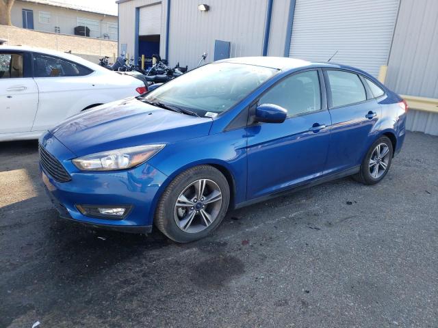FORD FOCUS SE 2018 with VIN 1FADP3F24JL260138 - Photo from auction
