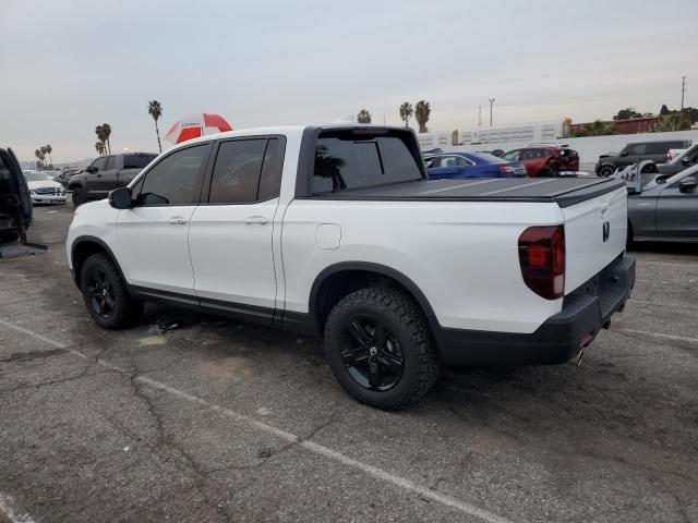 Photo 2 from auction – 2022 HONDA RIDGELINE with VIN 5FPYK3F80NB010815