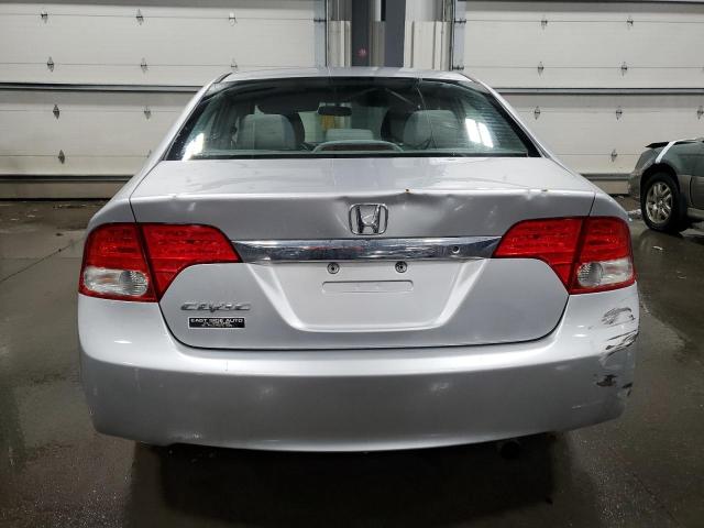 Photo 6 from auction – 2011 HONDA CIVIC LX with VIN 19XFA1F56BE012311