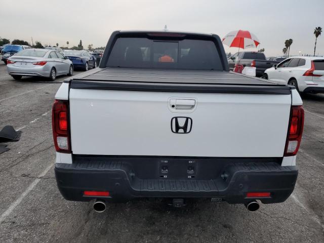 Photo 6 from auction – 2022 HONDA RIDGELINE with VIN 5FPYK3F80NB010815