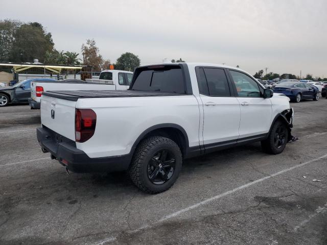Photo 3 from auction – 2022 HONDA RIDGELINE with VIN 5FPYK3F80NB010815