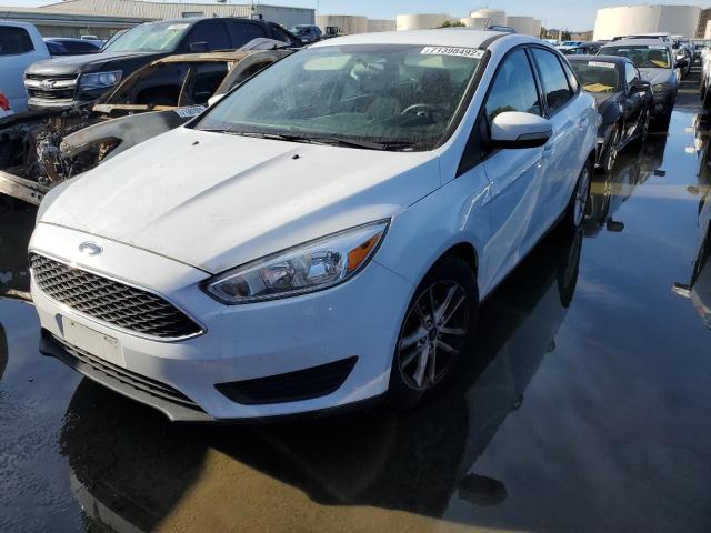FORD FOCUS 2017 with VIN 1FADP3F21HL300184 - Photo from auction