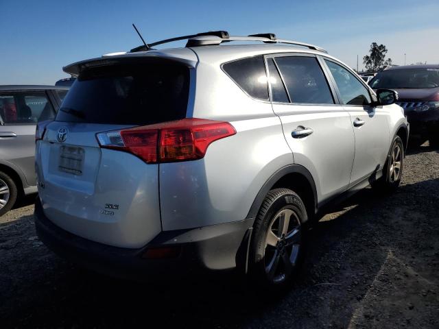 Photo 3 from auction – 2015 TOYOTA RAV4 XLE with VIN JTMRFREV2FD140955
