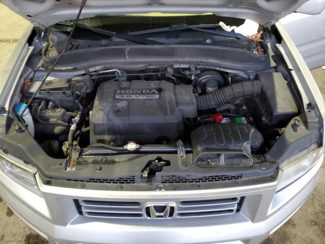 Photo 11 from auction – 2006 HONDA RIDGELINE with VIN 2HJYK16596H526052