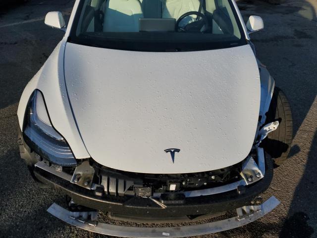 Photo 11 from auction – 2020 TESLA MODEL 3 with VIN 5YJ3E1EC1LF625178