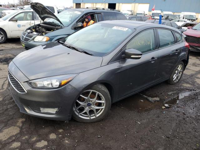 FORD FOCUS SE 2015 with VIN 1FADP3K27FL210203 - Photo from auction