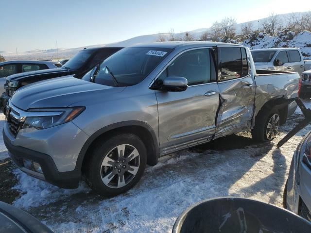 HONDA RIDGELINE 2018 with VIN 5FPYK3F71JB013126 - Photo from auction