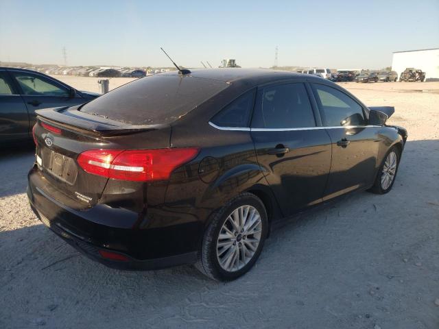 Photo 3 from auction – 2016 FORD FOCUS TITA with VIN 1FADP3J28GL237168
