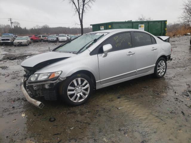 HONDA CIVIC LX 2011 with VIN 2HGFA1F59BH309272 - Photo from auction