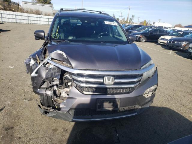 Photo 5 from auction – 2016 HONDA PILOT TOUR with VIN 5FNYF5H92GB019579