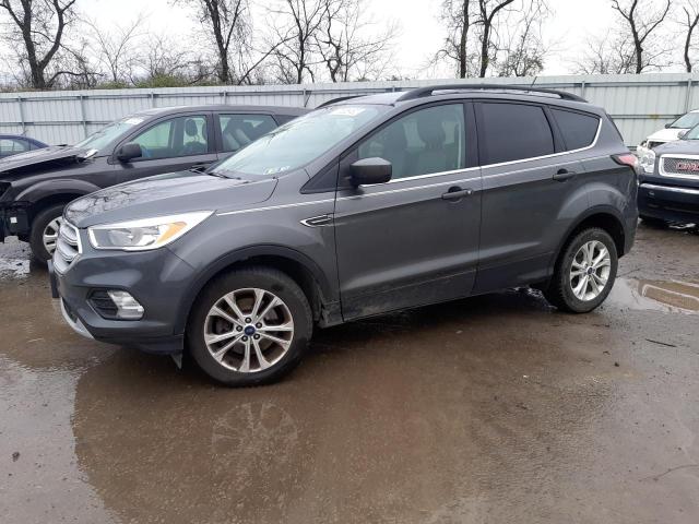 FORD ESCAPE SE 2018 with VIN 1FMCU9GD5JUB18646 - Photo from auction
