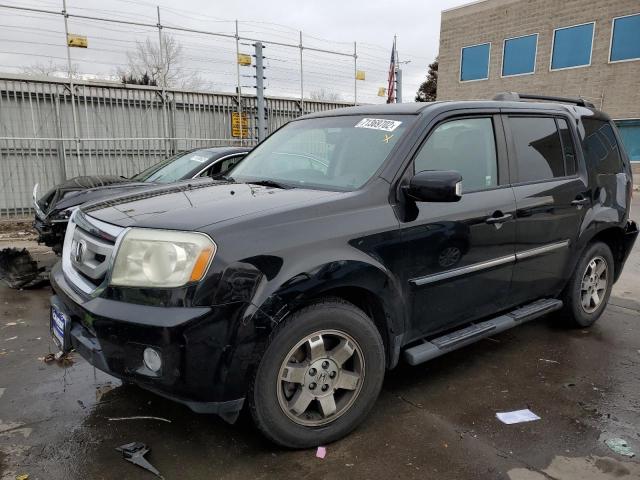HONDA PILOT TOUR 2011 with VIN 5FNYF4H96BB020253 - Photo from auction
