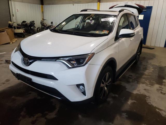 TOYOTA RAV4 XLE 2017 with VIN JTMRFREV5HJ707714 - Photo from auction