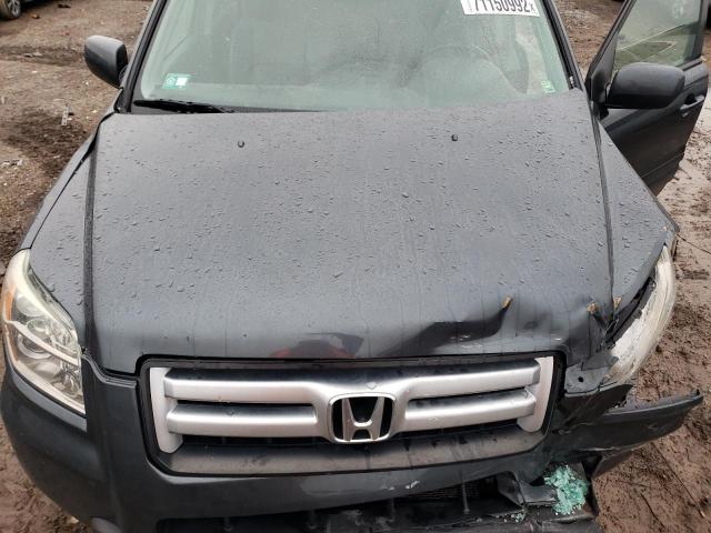 Photo 12 from auction – 2006 HONDA PILOT EX with VIN 2HKYF18656H503289