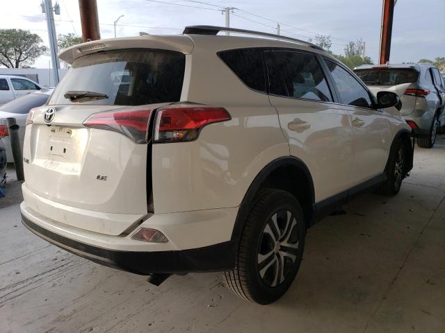 Photo 3 from auction – 2018 TOYOTA RAV4 LE with VIN JTMZFREV2JJ183685