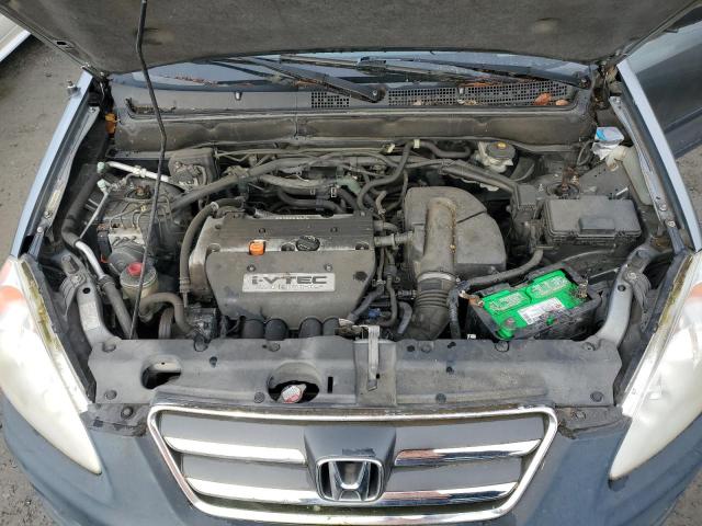 Photo 12 from auction – 2005 HONDA CR-V LX with VIN JHLRD68585C009049