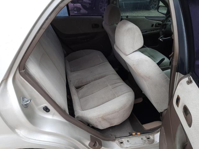 Photo 10 from auction – 1999 MAZDA PROTEGE DX with VIN JM1BJ2222X0164960