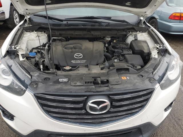 Photo 12 from auction – 2016 MAZDA CX-5 TOURI with VIN JM3KE4CY5G0916578