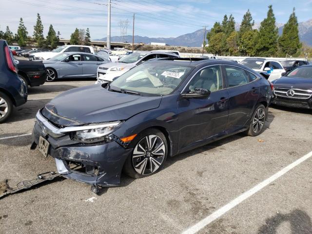 HONDA CIVIC EX 2018 with VIN JHMFC1F34JX015861 - Photo from auction
