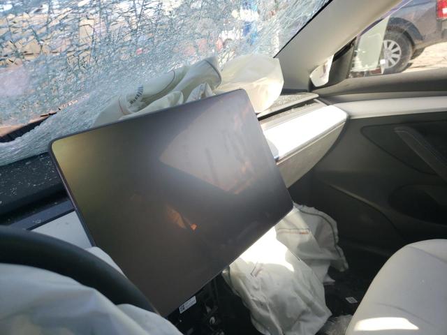 Photo 9 from auction – 2022 TESLA MODEL 3 with VIN 5YJ3E1EBXNF115440