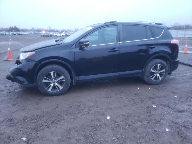 Photo 1 from auction – 2018 TOYOTA RAV4 LE with VIN 2T3BFREV5JW763810