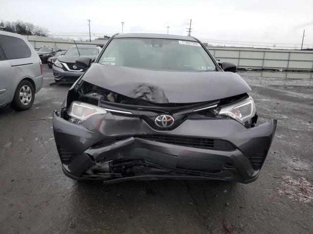 Photo 5 from auction – 2018 TOYOTA RAV4 LE with VIN JTMBFREV3JJ260128