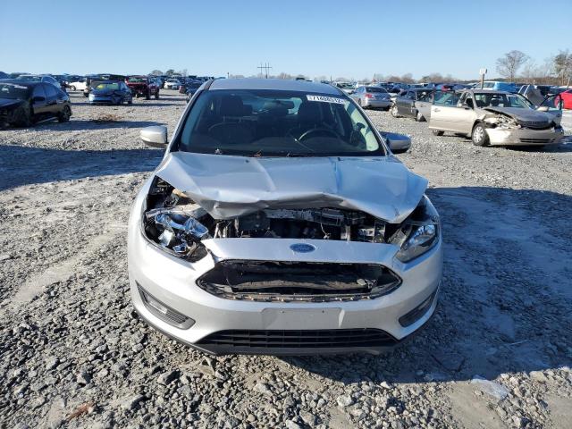 Photo 5 from auction – 2015 FORD FOCUS SE with VIN 1FADP3K21FL341790