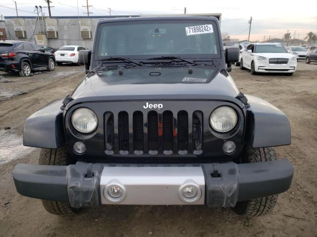 Photo 5 from auction – 2014 JEEP WRANGLER U with VIN 1C4BJWEGXEL119646