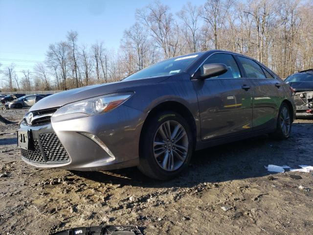 TOYOTA CAMRY LE 2017 with VIN 4T1BF1FK9HU404145 - Photo from auction
