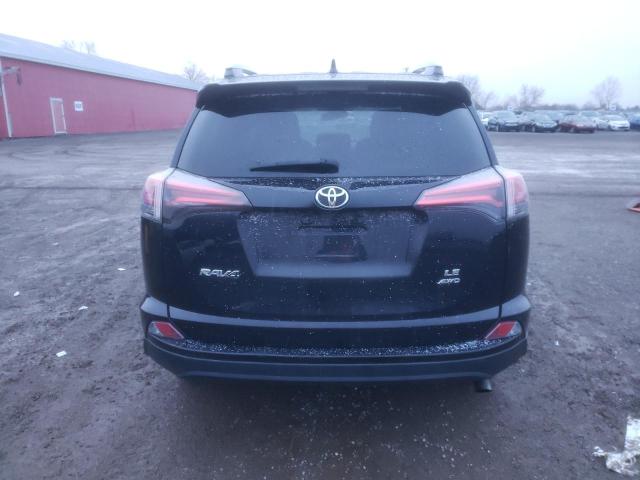 Photo 6 from auction – 2018 TOYOTA RAV4 LE with VIN 2T3BFREV5JW763810