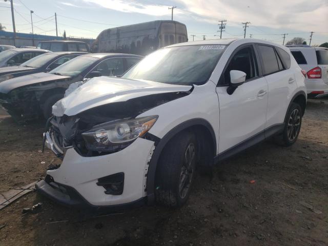 MAZDA CX-5 GT 2016 with VIN JM3KE2DY4G0690892 - Photo from auction