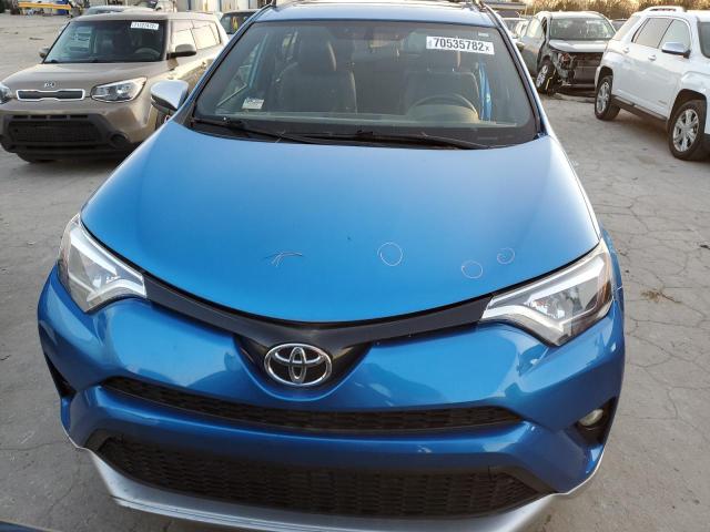 Photo 5 from auction – 2016 TOYOTA RAV4 SE with VIN JTMJFREV6GJ070571