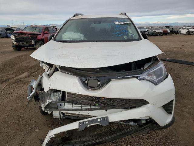 Photo 5 from auction – 2018 TOYOTA RAV4 LE with VIN 2T3BFREV1JW757115
