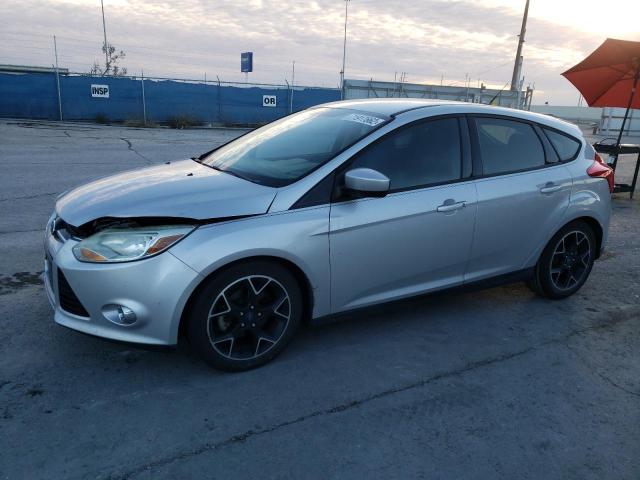 FORD FOCUS SE 2012 with VIN 1FAHP3K23CL477674 - Photo from auction