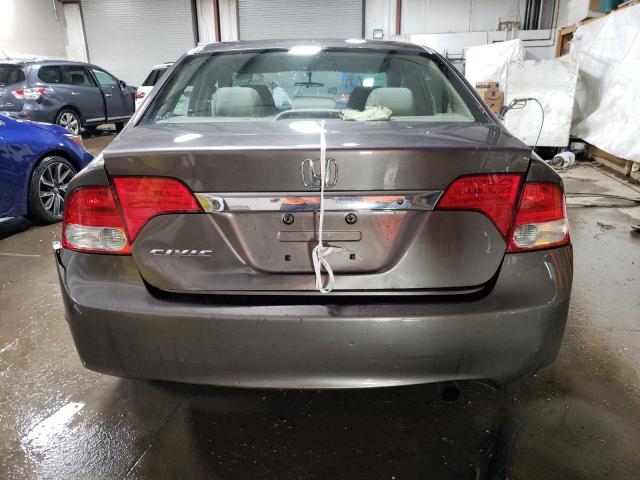 Photo 6 from auction – 2011 HONDA CIVIC LX with VIN 19XFA1F57BE046032