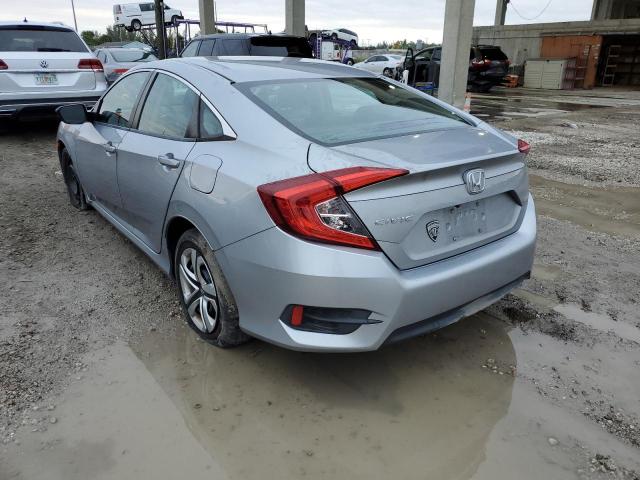 Photo 2 from auction – 2017 HONDA CIVIC LX with VIN 19XFC2F55HE041033