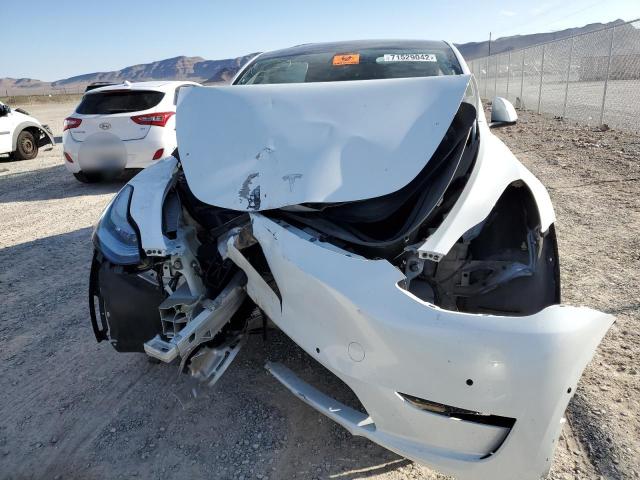 Photo 5 from auction – 2021 TESLA MODEL Y with VIN 5YJYGDEE7MF086697