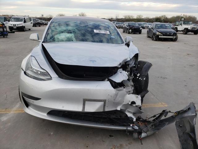 Photo 5 from auction – 2018 TESLA MODEL 3 with VIN 5YJ3E1EA7JF034834