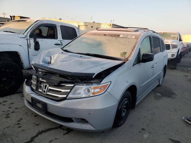 HONDA ODYSSEY TO 2012 with VIN 5FNRL5H97CB100990 - Photo from auction