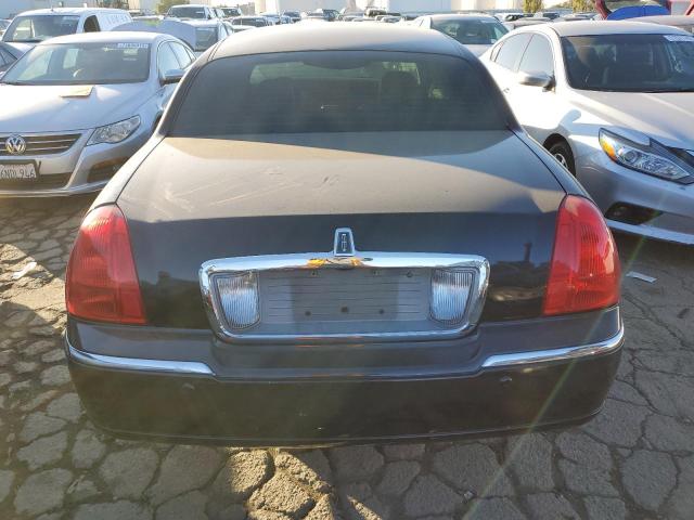 Photo 6 from auction – 2004 LINCOLN TOWN CAR E with VIN 1LNHM81W84Y629274