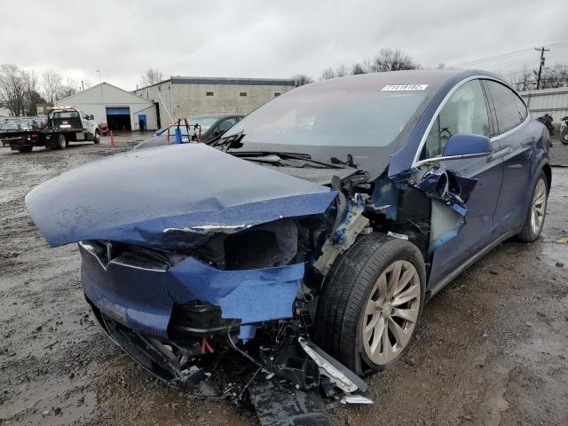 TESLA MODEL X 2018 with VIN 5YJXCDE2XJF089196 - Photo from auction