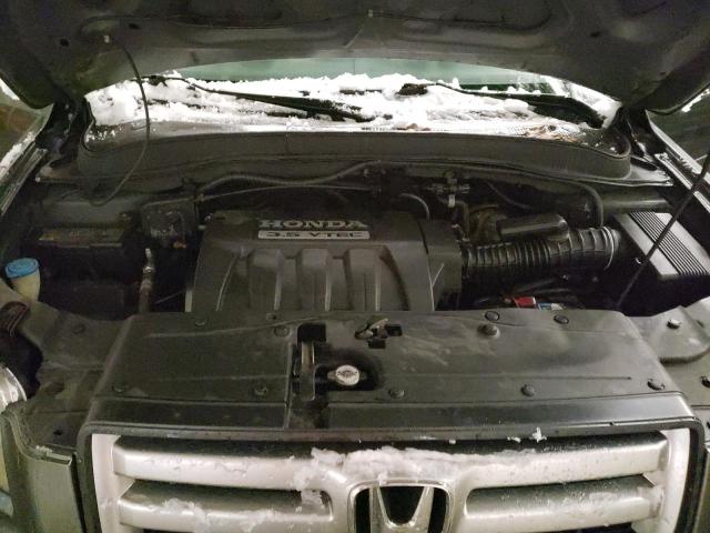Photo 12 from auction – 2007 HONDA PILOT LX with VIN 2HKYF18117H524002