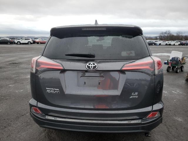 Photo 6 from auction – 2018 TOYOTA RAV4 LE with VIN JTMBFREV3JJ260128