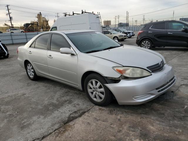 Photo 4 from auction – 2002 TOYOTA CAMRY LE with VIN 4T1BF30K32U034113