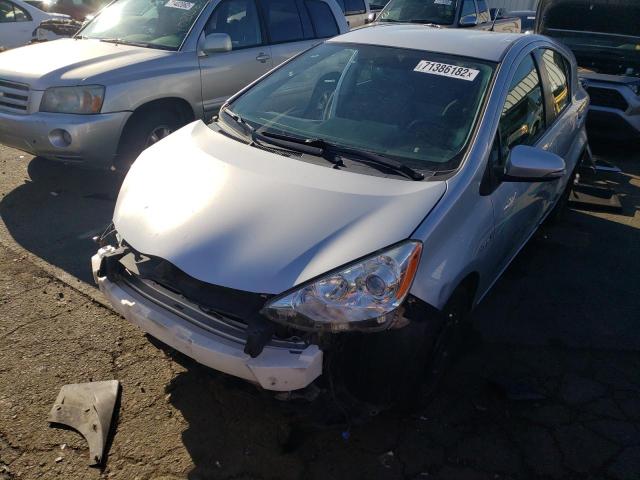 TOYOTA PRIUS C 2014 with VIN JTDKDTB32E1068596 - Photo from auction