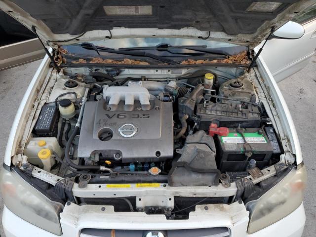 Photo 11 from auction – 2002 NISSAN MAXIMA GLE with VIN JN1DA31A12T305485