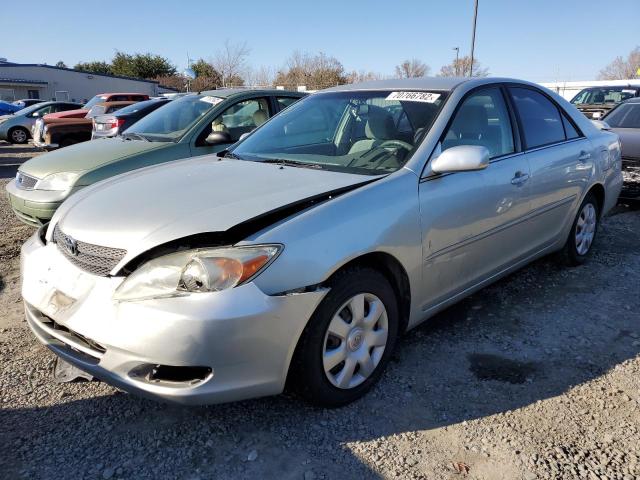 TOYOTA CAMRY LE 2002 with VIN JTDBE32K320070427 - Photo from auction
