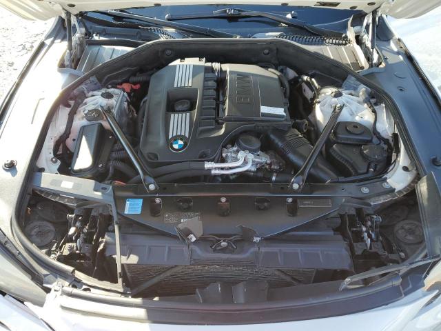 Photo 11 from auction – 2011 BMW 740 I with VIN WBAKA4C53BC612809