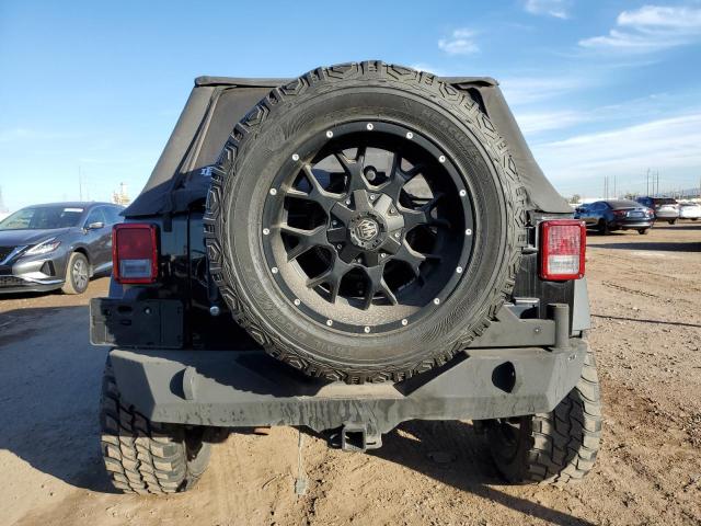 Photo 6 from auction – 2014 JEEP WRANGLER U with VIN 1C4BJWDG7EL231712