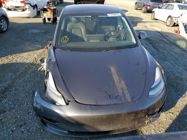 Photo 5 from auction – 2018 TESLA MODEL 3 with VIN 5YJ3E1EB2JF068947